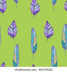 Seamless vector pattern with feathers in bohemian style on green. Ink drawn vector illustration for prints, fabric, wrapping and other design.