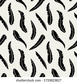 Seamless vector pattern with feathers. Trendy background for poster, postcard, wrapper, packaging, fabric. background with feathers silhouettes