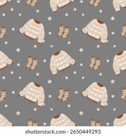 Seamless vector pattern featuring cozy sweaters, socks, and autumn leaves. Hand-drawn design ideal for warm seasonal textiles, wrapping paper, and childrens clothing.