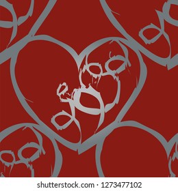 A seamless vector pattern featuring repeating hearts. This romantic texture would be ideal for use as a textile design or wrapping paper.