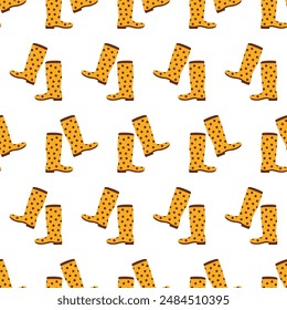 Seamless vector pattern featuring yellow polka dot rubber boots. Ideal for textiles, wallpapers, and children's products. Bright, playful design perfect for rainy day themes and cheerful decor