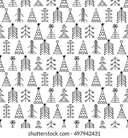 Seamless vector pattern with fir-trees. Black and white seasonal winter background with different decorative hand drawn fir tree. Graphic illustration. Series of winter seamless vector patterns.