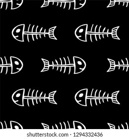 Seamless vector pattern of fish skeletons black and white
