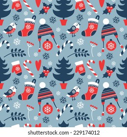 Seamless vector pattern in a flat style winter holidays. Christmas tree, candy canes, mittens, snowflakes, and other objects.