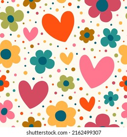 Seamless vector pattern with flowers and hearts. Great for fabric, wallpaper and wrapping paper.