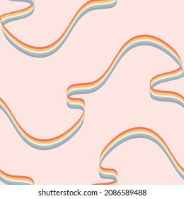 Seamless vector pattern with flowing rainbow on light pink background. Soft wavy ribbon wallpaper design. Decorative pastel stripe fashion textile.