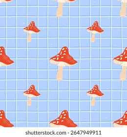Seamless vector pattern with fly agaric mushrooms. Cozy hand-drawn design for autumn textiles, wrapping paper, and childrens clothing.