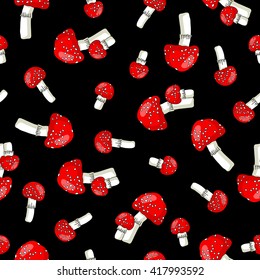 Seamless vector pattern of fly agaric on black background. Wrapping paper.
