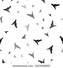 Seamless vector pattern with fox symbols, creating a creative monochrome background with rotated elements. Vector illustration on white background