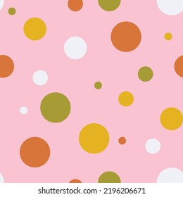 Seamless vector pattern with fun dots on pink background. Simple geometrical circle wallpaper design. Decorative baby shower fashion textile.