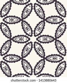 Seamless vector pattern. Geometric floral kaleidoscope. Repeating daisy petal flower tile background. Monochrome surface design textile swatch, decorative gift wrap, black white boho all over print\u2028