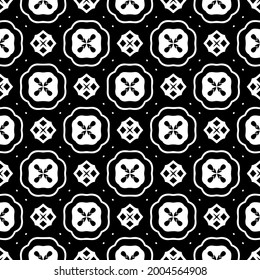 Seamless vector pattern in geometric ornamental style. Black and white 

pattern.
