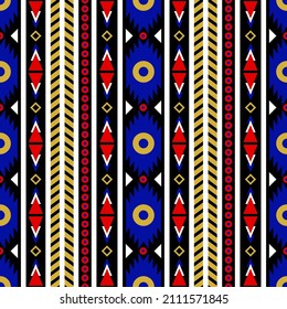Seamless vector pattern with geometric vertical ornament. Textile print in boho style. Ethnic design with folk motifs of Maya, Aztecs, Mexicans. 
