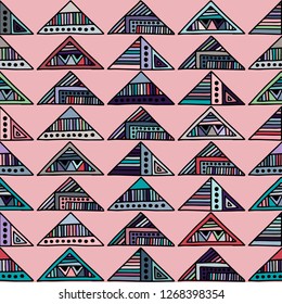 Seamless vector pattern. geometrical background with hand drawn decorative tribal elements. Print with ethnic, folk, traditional motifs. Graphic illustration for wrapping, wallpaper, fabric, packing