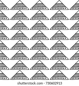 Seamless vector pattern. Geometrical background with hand drawn decorative tribal elements in black and white colors. Print with ethnic, folk, traditional motifs. Graphic vector illustration.