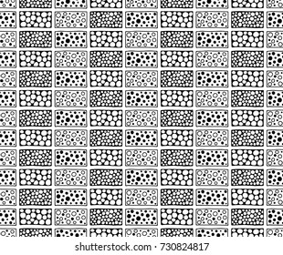 Seamless vector pattern. Geometrical background with hand drawn decorative tribal elements in black and white colors. Print with ethnic, folk, traditional motifs. Graphic vector illustration.