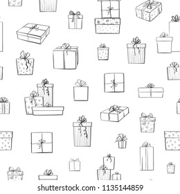 Seamless vector pattern of gift boxes. Hand drawings on a white background