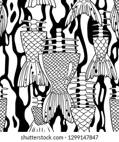 Seamless vector pattern with gnawed fish tails.