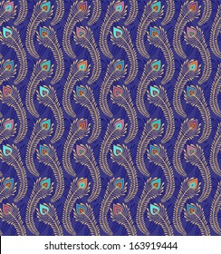 Seamless vector pattern with golden peacock, Pavonine tail  feathers on blue background