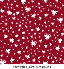 Seamless vector pattern from graceful hearts on a rad background. Valentine's Day, Mother's Day, Wedding day or Women's Day. Background for gift packing. Endless texture for textile design. 