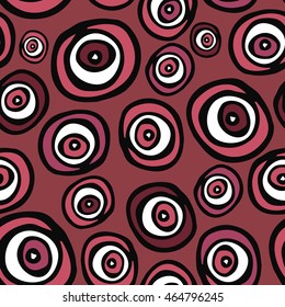 Seamless vector pattern of the graphic images of the circle. Handmade. Pink shades. Vanguard. It can be used for packaging, invitations, greeting cards, textiles, fabrics, etc.