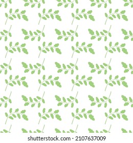 Seamless vector pattern with green leaves. Decorative background. Modern minimalists style design.