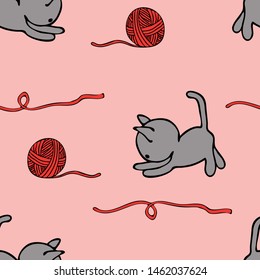 Seamless Vector Pattern With Grey Cats On Pink Background. Cute Kitten And Yarn Ball Wallpaper Design. Animal Fashion Textile.