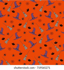 Seamless vector pattern. Halloween pattern with witch hats and brooms and bats and spiders on the orange background.