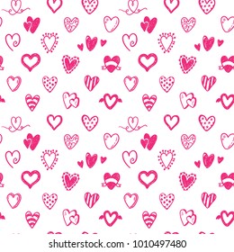 Seamless vector pattern with hand drawn doodle hearts. Valentines day, wedding design.