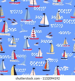 Seamless vector pattern with hand drawn sailing yachts with fish. Summer bright background for fabric design.