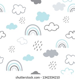Seamless vector pattern with hand drawn clouds and rainbows
