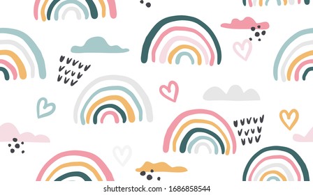 Seamless vector pattern with hand drawn rainbows and sun Trendy baby texture for fabric textile wallpaper apparel wrapping