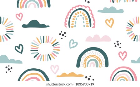 Seamless vector pattern with hand drawn rainbows and sun Trendy baby texture for fabric textile wallpaper apparel wrapping