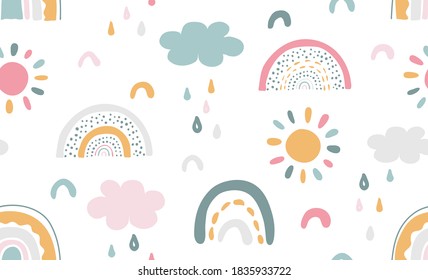 Seamless vector pattern with hand drawn rainbows and sun Trendy baby texture for fabric textile wallpaper apparel wrapping