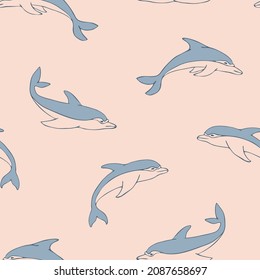 Seamless vector pattern with hand drawn dolphins on pink background. Simple happy fish wallpaper design. Decorative children fashion textile.