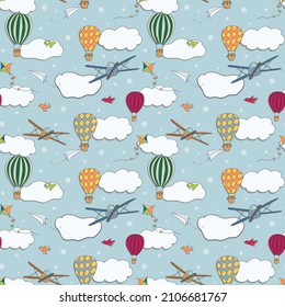 Seamless vector pattern, hand drawn hot air baloons flying in the blue sky, pattern for backgrounds, wrapping paper, fabrics and other designs