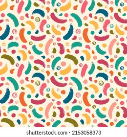 Seamless vector pattern with hand drawn brush strokes and dots in retro color palette.