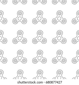 Seamless vector pattern of hand spinner toy - stress and anxiety relief. Hand drawn picture