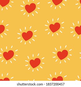 Seamless vector pattern hand-drawn vector illustration of a red heart with rays in an orange circle. Flat