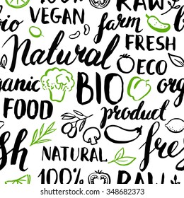 Seamless vector pattern with handwritten food elements. Organic farm natural product. Ink brush lettering. Hand drawn leaves and vegetables. 