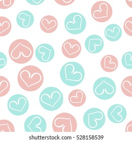 Seamless vector pattern with heart in blue and pink colors. Perfect for wrapping paper, wallpaper, repeating elements. Perfect for Valentine's Day.