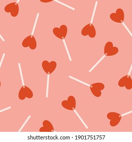 Seamless vector pattern with heart lollipop in flat vintage style. Valentines background, romantic holiday. Love and romance symbol. Pattern for poster, print, card, fabric and wedding