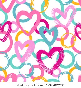 Seamless vector pattern with hearts and dots
