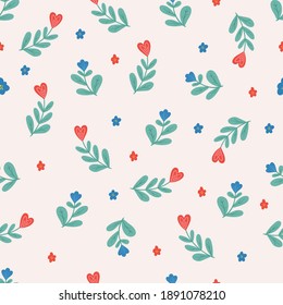 Seamless vector pattern with hearts and flowers. Love background for Valentine's day. Seamless bright romantic design for fabric or wrap paper.