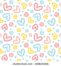 Seamless vector pattern with hearts in pastel colors.