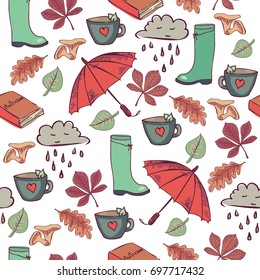 Seamless vector pattern Hello Autumn with umbrellas, boots and different leaves