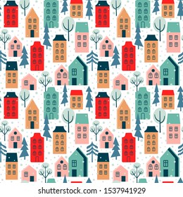 Seamless vector pattern with houses, trees and snow. City landscapes background.