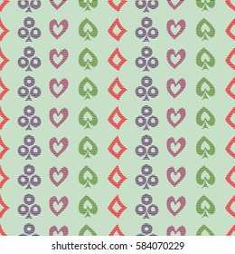 Seamless vector pattern with icons of playings cards. Green background with hand drawn symbols. Decorative repeat ornament. Series of Gaming and Gambling Seamless vector Patterns