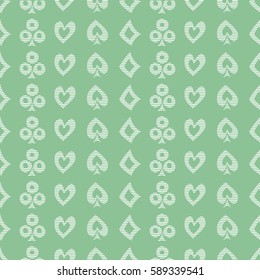 Seamless vector pattern with icons of playings cards. Green background with hand drawn symbols. Decorative repeat ornament. Series of Gaming and Gambling Seamless vector Patterns.