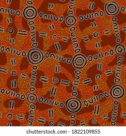 Seamless vector pattern including ethnic Australian motive with colorful dotted different shapes and elements on orange background